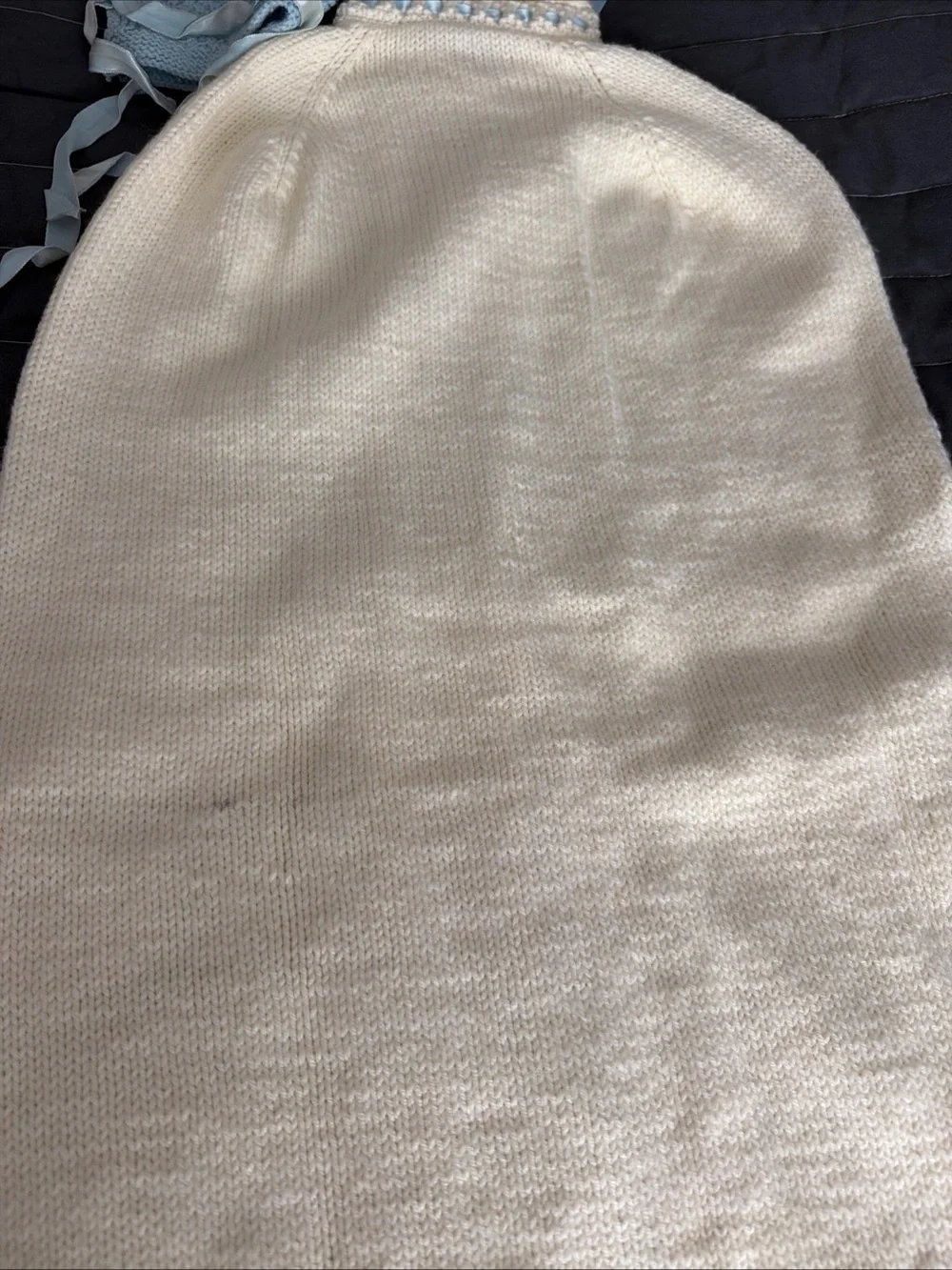 Cream Knit Hooded Baby Snuggler with Light Blue Accents